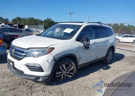 2018 Honda Pilot Elite z USA, uszkodzony, nr VIN 5FNYF6H01JB014145